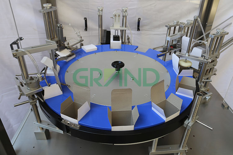 Automatic Vertical Rotary Cartoning Machine details Machina de cartonización giratoria vertical automática02